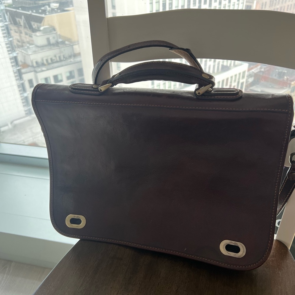 Brown Messenger Bag with Structured Design and Chrome Accents